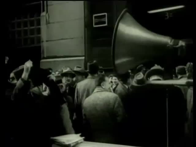 Garment workers gather to vote at a meeting on Dressmakers' strike at in New York City circa 1958-MGM PICTURES, UNIVERSAL-INTERNATIONAL NEWSREEL, USA, filmed in 1958