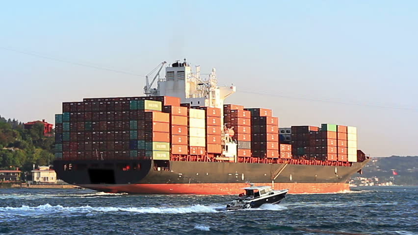 Cargo ship full of containers sailing from Black Sea. Container Transportation 
