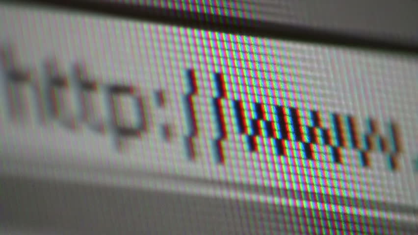 Close up of mouse cursor typing in web browser address bar