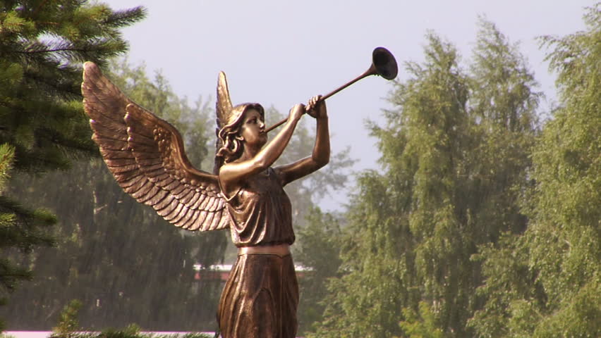 Statue of an angel in the rain