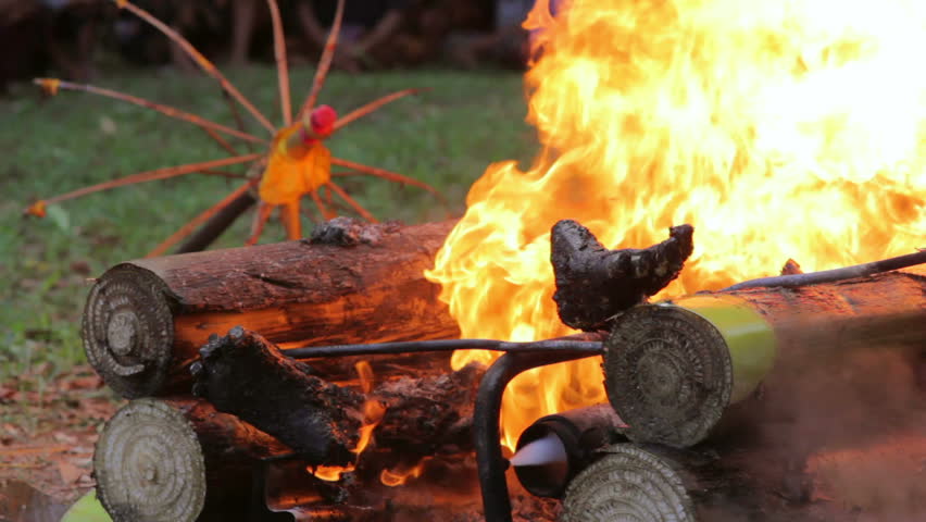 burning dead body in Balinese funeral, Bali, Indonesia