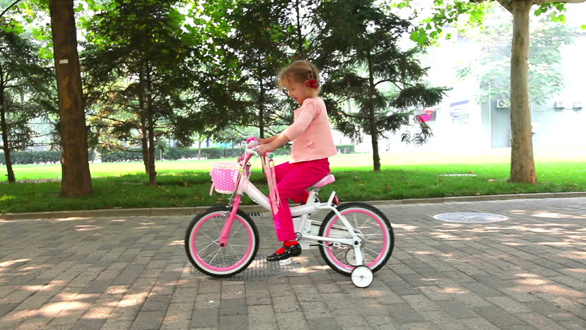 Little girl on bike