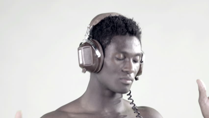 time lapse of a young african guy waving and dancing with his hands in a cool attitude 
