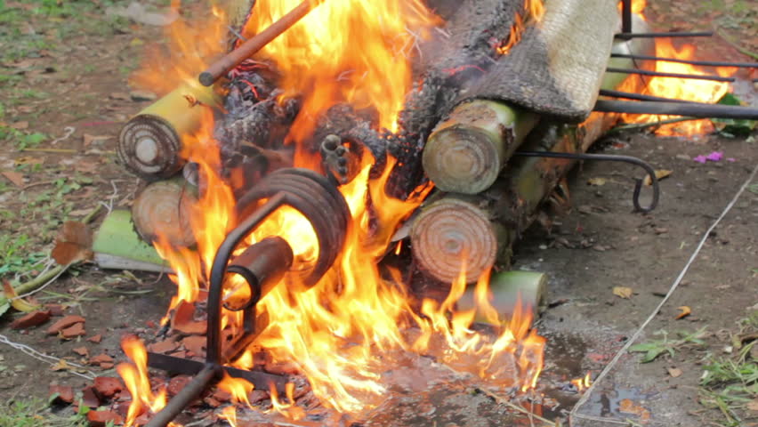 BALI - MAY 2012: burning dead body in Balinese funeral