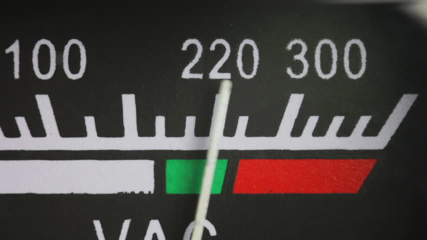 Vintage analog volt meter close up