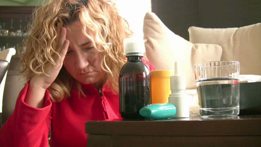 Sick women sneezing