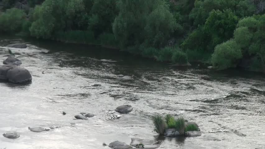 Water flowing over boulders