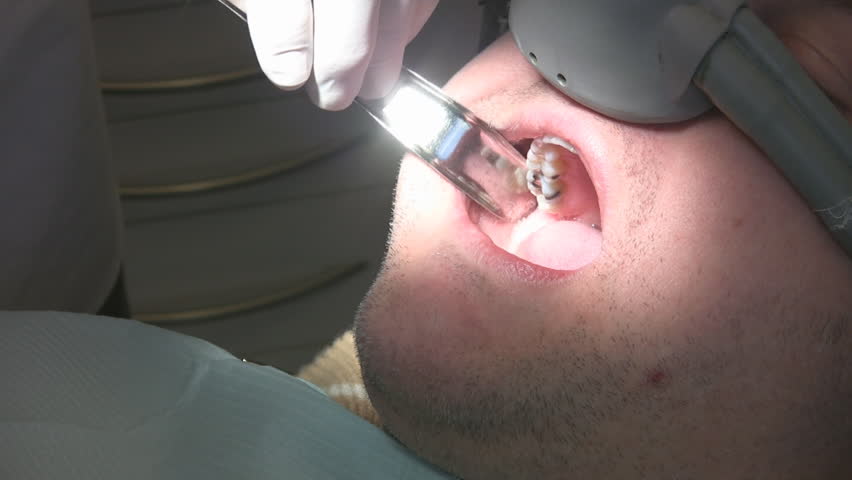 Dental patient gets injection.