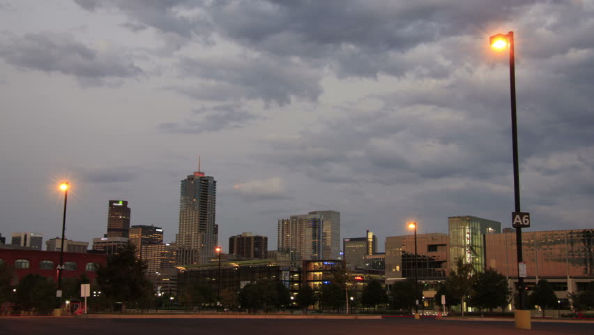 Downtown Denver, CO in time lapse as dusk turns to night.  This shot could be a nice setup for Denver nightlife.