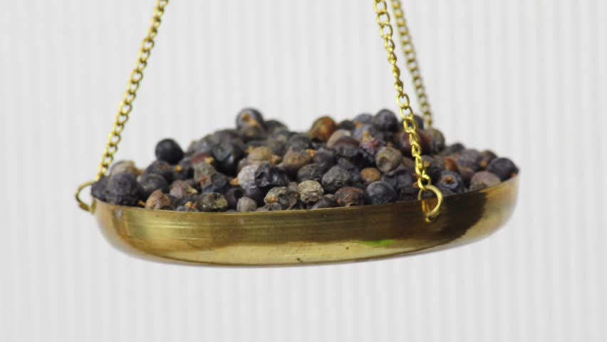 juniper berries on a balance