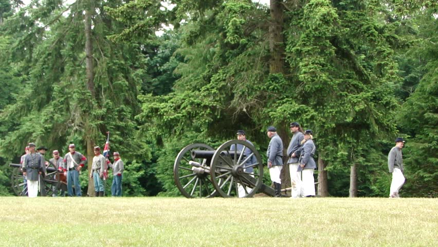 PORT GAMBLE, WA - JUN 20 -  	Confederate artillery men inspect their cannon 		before a mock battle at Port Gamble WA on Jun 20, 2009.
