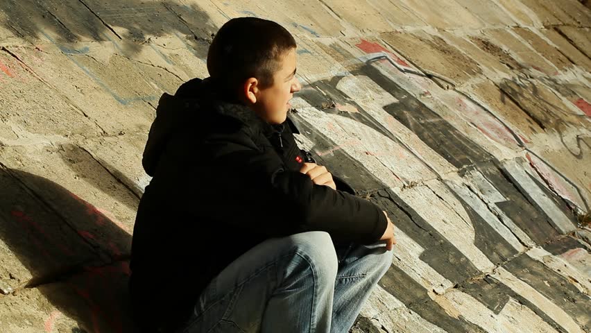 Boy is offered cigarettes and refuses