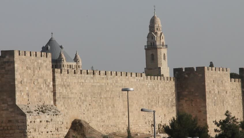 Christian churches and ancient walls of old city Jerusalem.  Dormition Church Hagia Maria.  Dormition Abbey and Mount Zion Church Israel