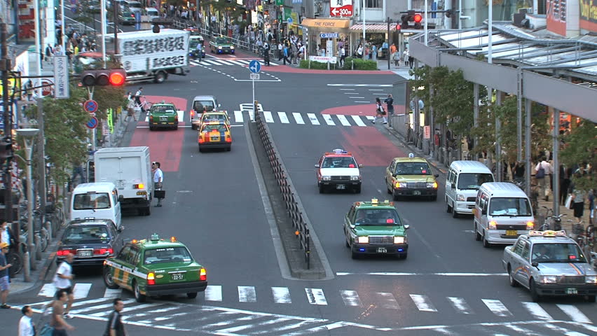 SHINJUKU, TOKYO, JAPAN - CIRCA 2012: Shinjuku crossroad