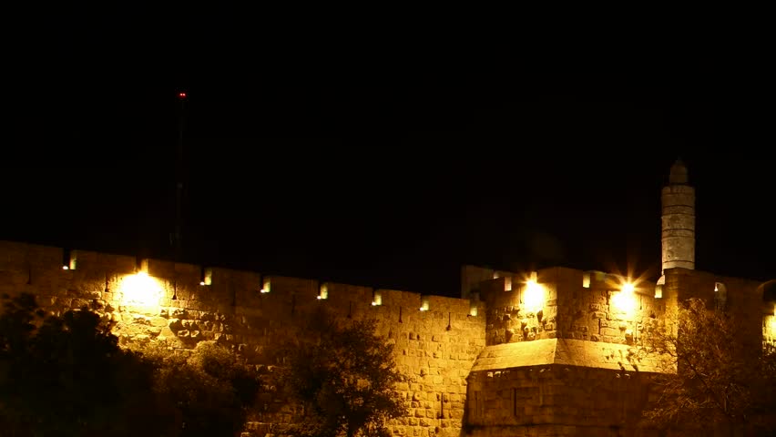 JERUSALEM, ISRAEL - NOVEMBER 01: Drivers, commuters and tourists hurry to their destinations during rush hour near the wall of Jerusalem, time lapse view, Israel, 01 November 2012