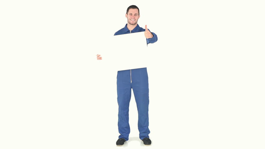 Man wearing overall and holding a blank board against white background