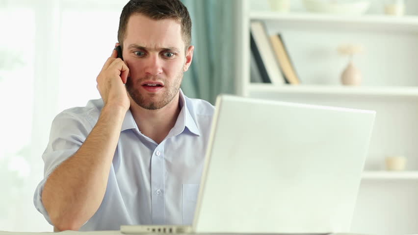 Stressed man having on-call duty at home