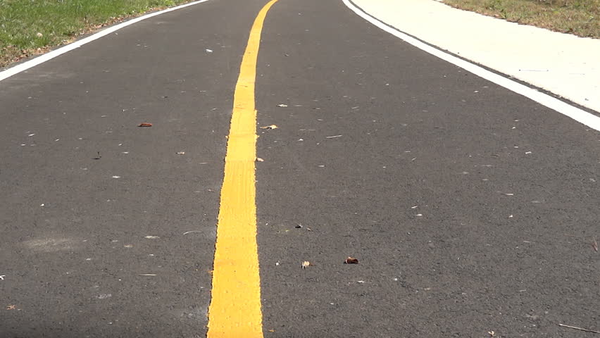 Tilting shot of bicycle trail in Jones Point Park In Alexandria Virginia HD 1080p