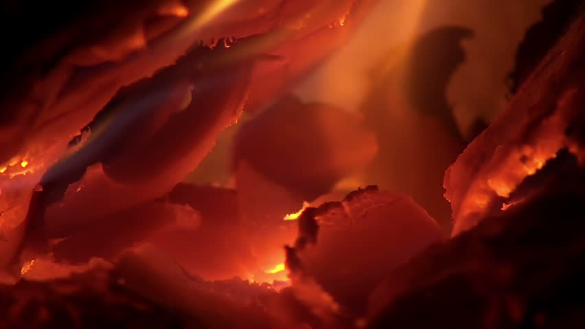 Fire with ember burning in furnace slow motion

