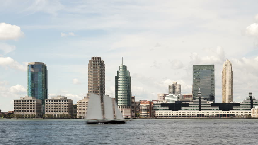 Time-lapse sequence of boats and ferry traffic on the Hudson River, panning to the left, in front of the skyline of Jersey City, New Jersey on September 16, 2012.