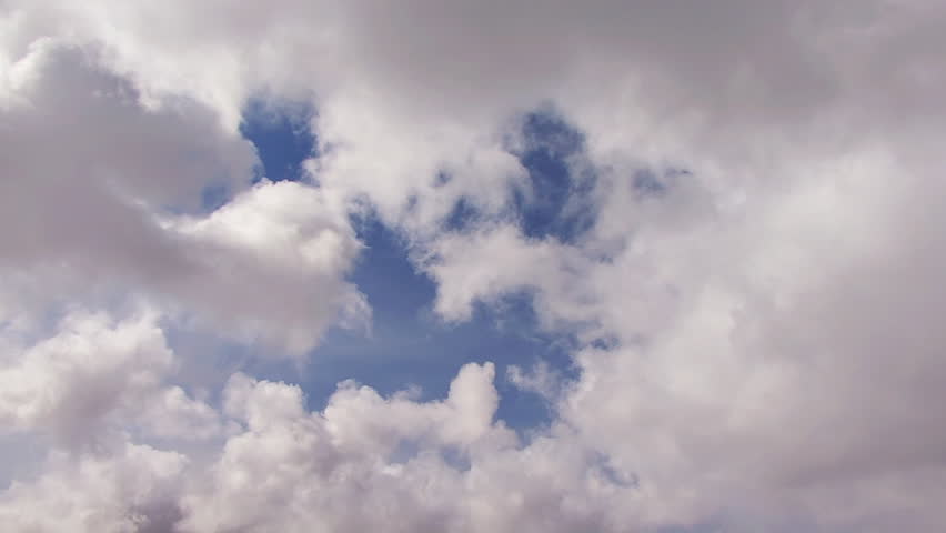 Dynamic rolling clouds bumbling in as a weather system replaces previously clear skies.