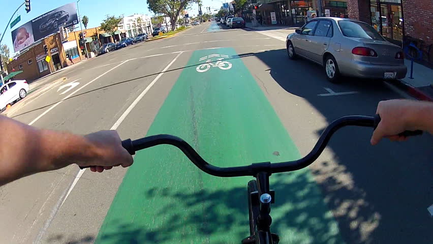 LONG BEACH - NOV 12: The point of view of someone riding a bike in the new bicycle lanes on November 12, 2012 in Long Beach, CA. Long Beach has the goal to be the most bicycle friendly U.S. city.