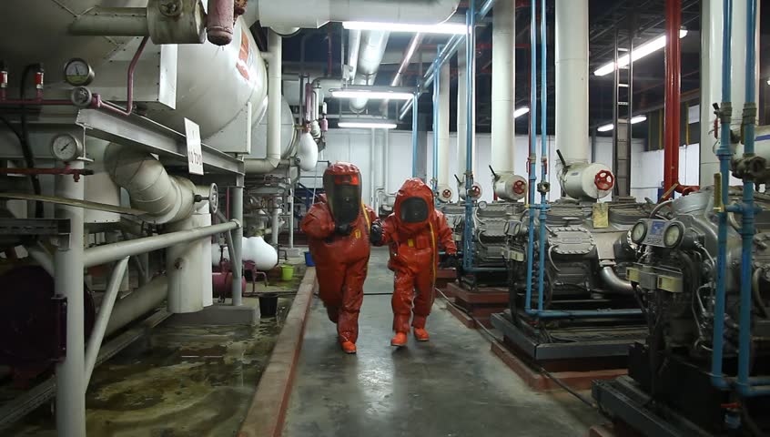 NORTHERN ISRAEL -DECEMBER 17: Firefighters practice leak accident of corrosive toxic hazardous material Ammonia liquid in seven food factories using protective suites, Northern Israel December 17 2012