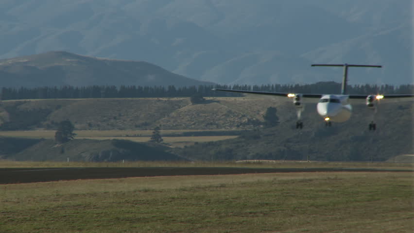 WANAKA AIRFIELD - MARCH  22: An Air New Zealand Link touches down for the bi annual air show on March 22, 2008 in Wanaka New Zealand