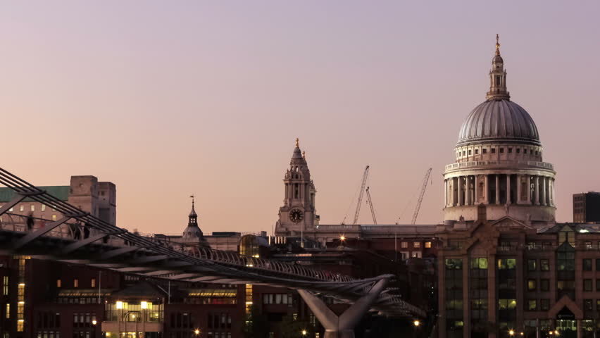 St Paul's Cathedral and Millennium Bridge sunset time-lapse mid shot. Stunning time lapse of St Paul's Cathedral with exposure adjusting as the sun sets.