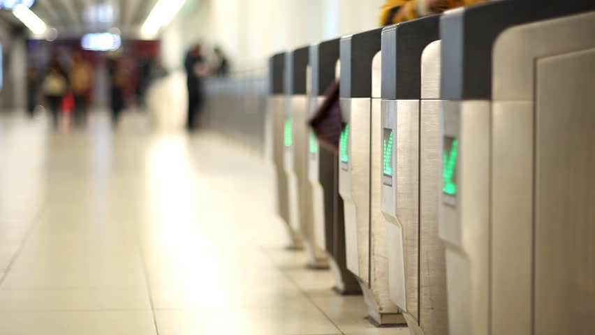 Entry and exit gates in a tube station. Selective focus. HD version  24/01/2009