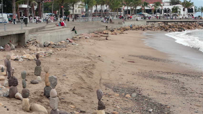 PUERTO VALLARTA, MEXICO NOV 2012: As international economy improves and drug war eases visitors and business returns to Mexico tropics. Puerto Vallarta Malecon Boardwalk timelapse fast.