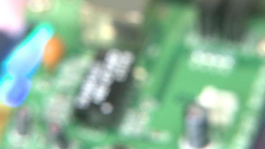 Computer circuit board rotating over CD