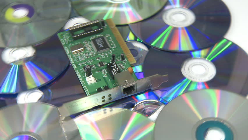 Computer circuit board rotating over CD