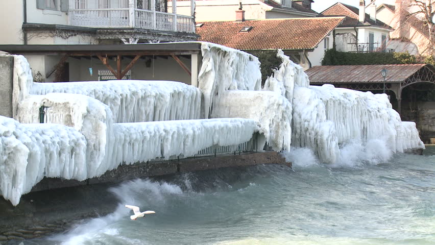 Extreme Ice Storm Hits Lake Shore. Thick ice coats the shore of Lake Geneva after record breaking cold weather hits Europe in February 2012. Shot in Full HD 1920x1080 30 on Sony EX1