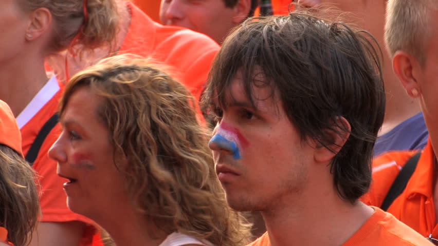 GRONINGEN, HOLLAND - JULY 11: Dutch soccer fans supporting their team during the final of the FIFA World Cup 2010 Netherlands vs. Spain - July 11, 2010 in Groningen, the Netherlands.