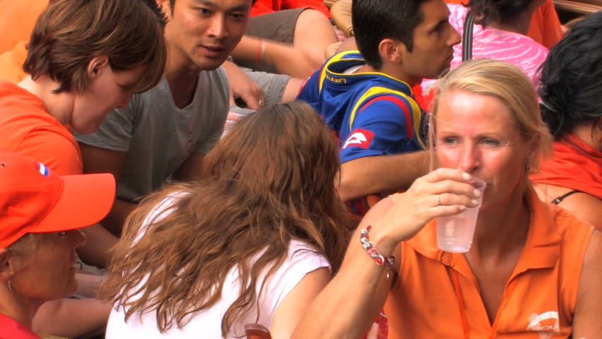 GRONINGEN, HOLLAND - JULY 11: Dutch soccer fans supporting their team during the final of the FIFA World Cup 2010 Netherlands vs. Spain - July 11, 2010 in Groningen, the Netherlands.
