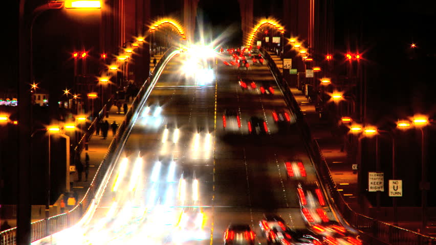 Time-lapse of busy night traffic on the Golden Gate Bridge
