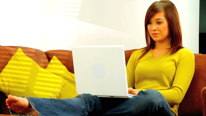 Young western oriental businesswoman clinching the deal at home