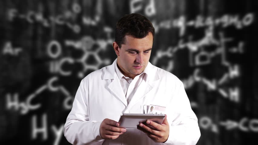 Scientist using Tablet PC with Scientific Chemistry Background