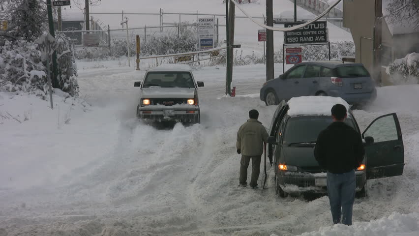 VANCOUVER - DECEMBER 23: A pick-up truck climbs a hill in Vancouver, Canada, December 23rd, 2008. Snowstorms over the holiday season, broke records in many parts of western Canada.