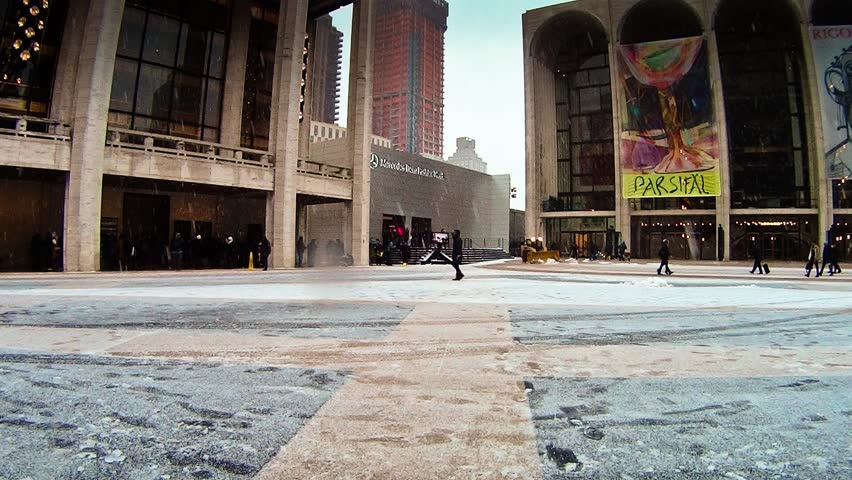 NEW YORK - FEBRUARY 8: Time Lapse of Fashion Week Tents with people coming and going in Lincoln Center in New York City on February 8, 2013.