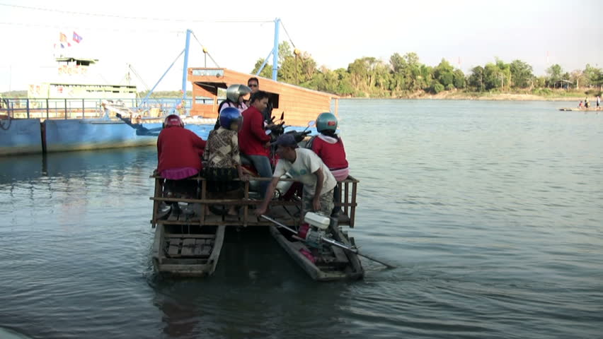 CAMBODIA - CIRCA MAY 2012: People ride on ferry boat on the Tonle Sap in Cambodia circa May 2012.