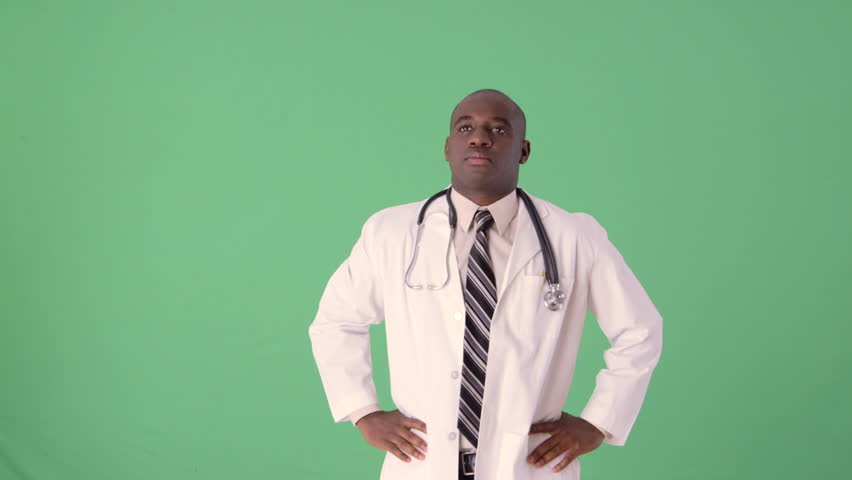 African American Doctor using touch screen and futuristic display