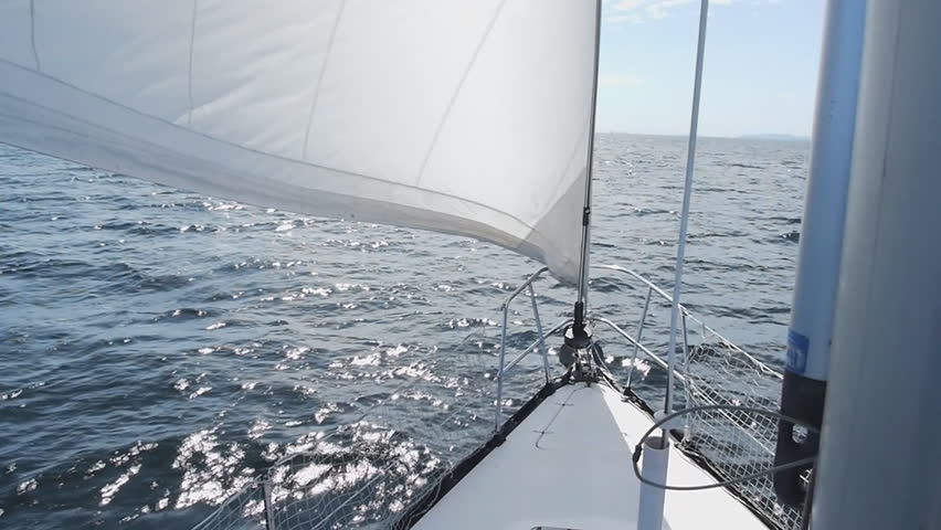 A sailboat from various perspective including wild angle and close up.