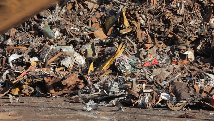 crane grabber working with recycling metal scrap
