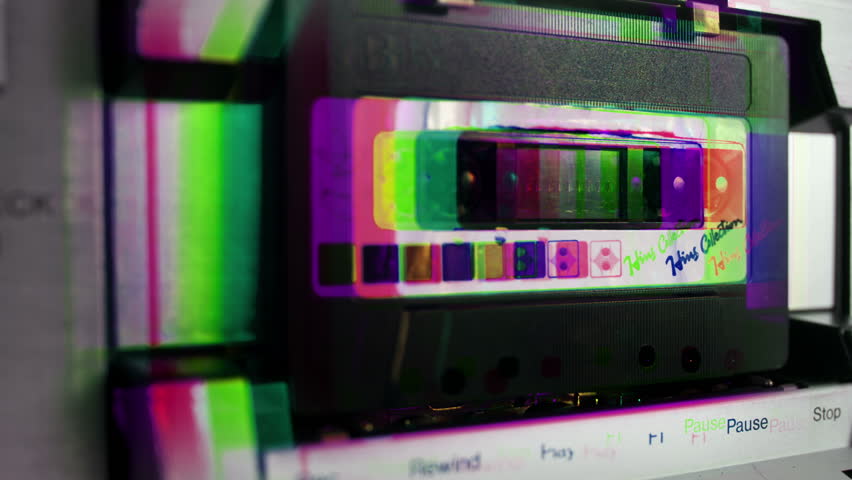sequence of old audio cassettes in a retro tape player
