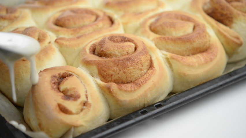 Swedish cinnamon rolls under sweet sauce