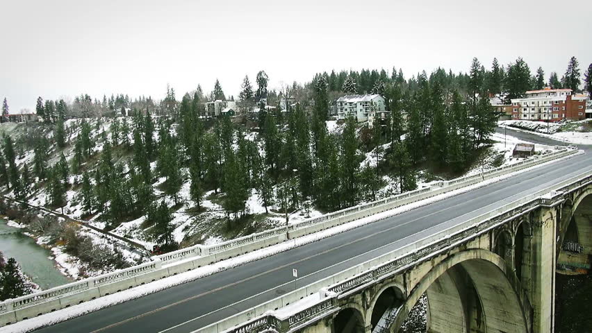 Aerial of large bridge with interesting architecture.