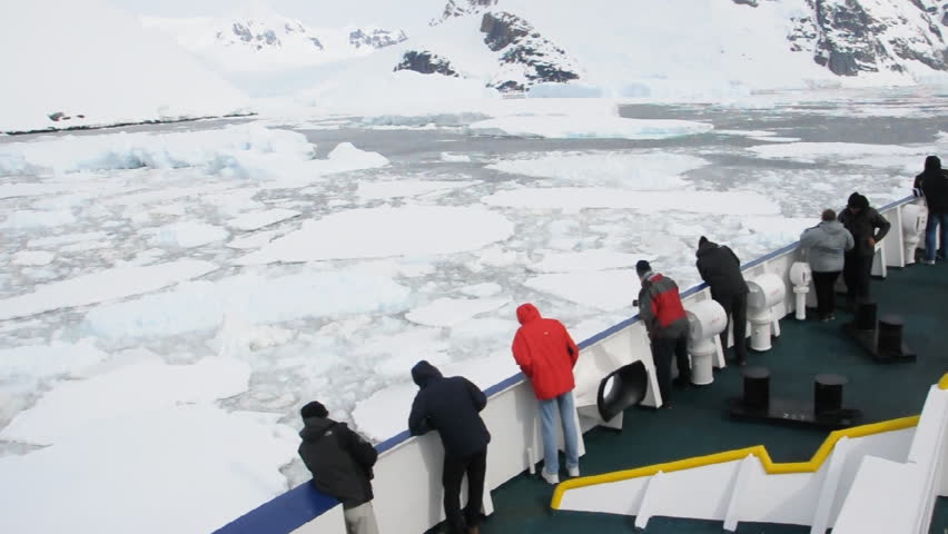 Expedition vessel moving through ice in Antarctic