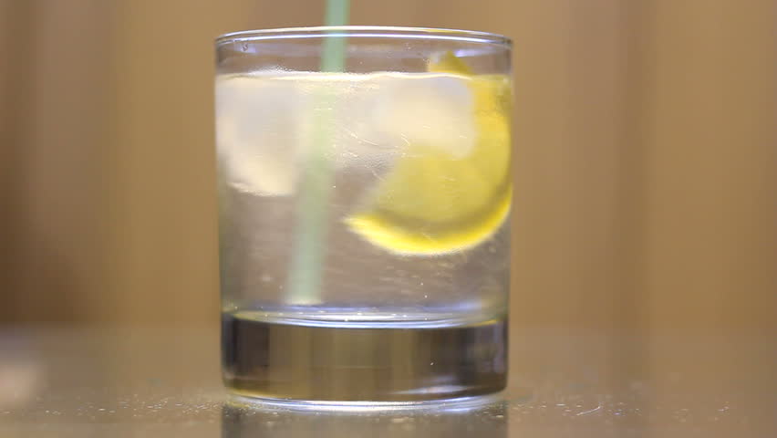 Glass of fresh cold lemonade